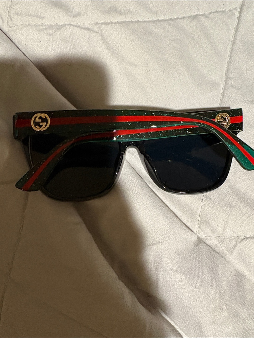 Green and red sunglasses